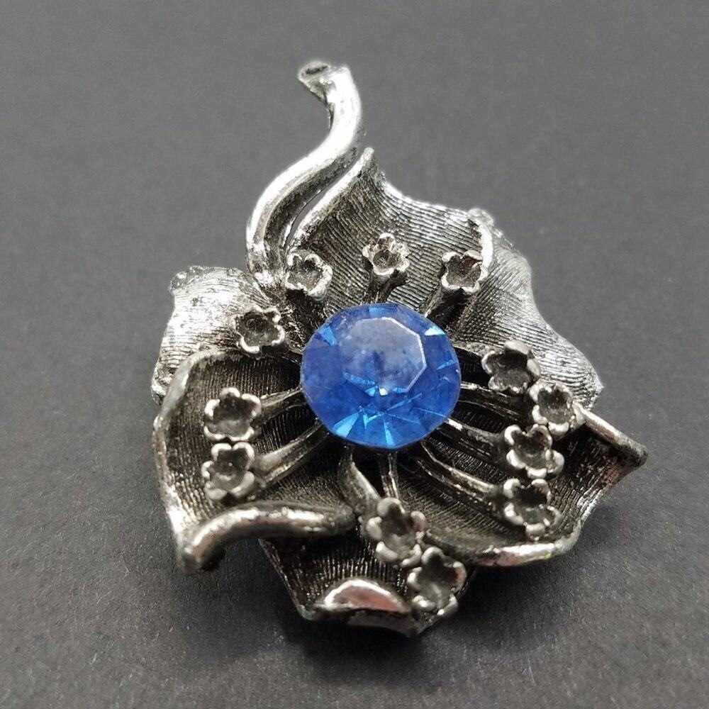 Vintage Flower Brooch, Silver Tone, Large Blue Rhinestone, Black Enamel, 1 7/8"